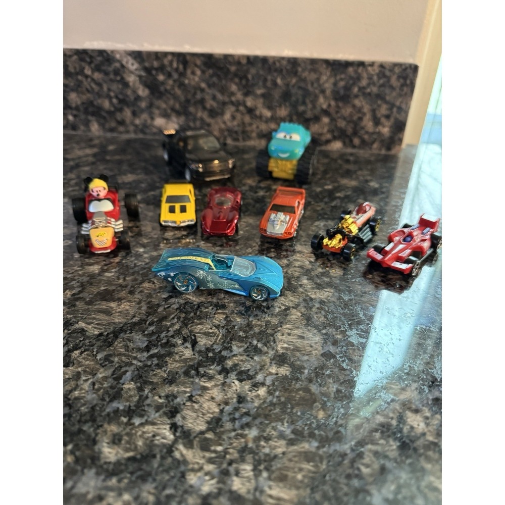 Hot Wheels Collection. McDonald's Happy Meal, Elsa Frozen. Pixar's Cars Ford